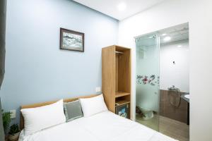 Ein Bett oder Betten in einem Zimmer der Unterkunft 5.T Hostel
