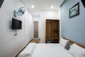 Ein Bett oder Betten in einem Zimmer der Unterkunft 5.T Hostel