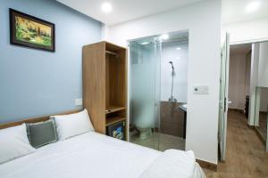 Ein Bett oder Betten in einem Zimmer der Unterkunft 5.T Hostel