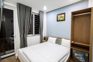 Ein Bett oder Betten in einem Zimmer der Unterkunft 5.T Hostel