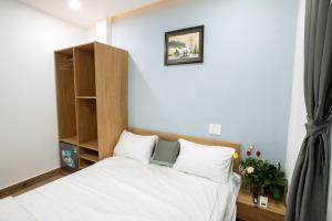Ein Bett oder Betten in einem Zimmer der Unterkunft 5.T Hostel