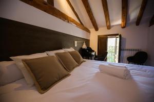 Postel nebo postele na pokoji v ubytování Hotel El Molino