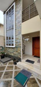 a building with a large window and a door at NCG Suite in Guayaquil