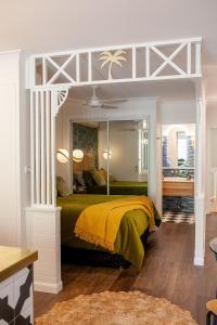 Postel nebo postele na pokoji v ubytování MUSE-Luxe Apartment in Port Douglas