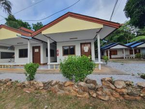 a rendering of a small house at pineapple resort in Ban Huai Thalaeng Phan