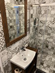 Kylpyhuone majoituspaikassa SUNBEAM DESIGN APARTMENT