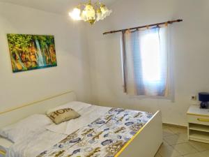 Postel nebo postele na pokoji v ubytování Apartment Daca