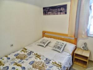 Postel nebo postele na pokoji v ubytování Apartment Daca