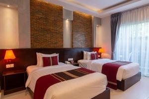 Кровать или кровати в номере Sovanna Hotel