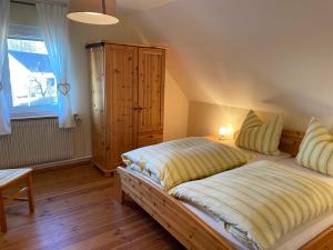 Postel nebo postele na pokoji v ubytování Ferienwohnung Woelfel
