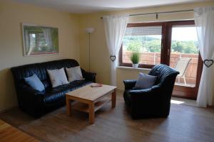 Posezení v ubytování Ferienwohnung Woelfel