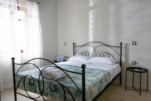 Postel nebo postele na pokoji v ubytování Pavlakis Lemon-Tree House