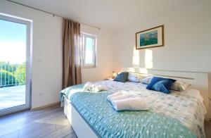 En eller flere senge i et værelse på Vila Vista + 35 billeder