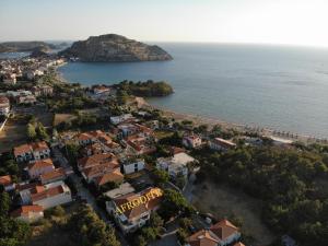 an aerial view of a town and the ocean at Afrodite Hotel Apartments in Myrina