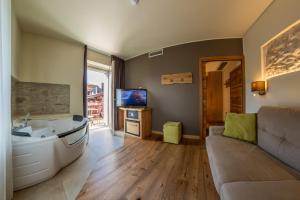 TV a/nebo společenská místnost v ubytování Hotel Firenze