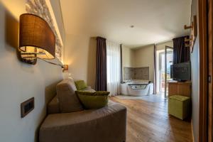 TV a/nebo společenská místnost v ubytování Hotel Firenze