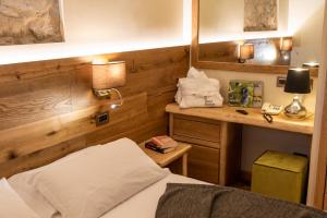 Postel nebo postele na pokoji v ubytování Hotel Firenze