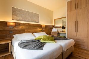Postel nebo postele na pokoji v ubytování Hotel Firenze
