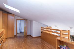 A bed or beds in a room at Flateli Sant Fèlix