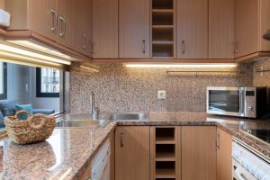 A kitchen or kitchenette at Flateli Sant Fèlix