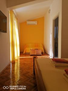 Łóżko lub łóżka w pokoju w obiekcie Salvia Apartments