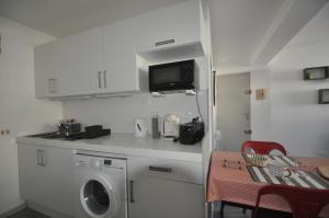 Kuchyň nebo kuchyňský kout v ubytování sassenage au pied du Vercors 2 appartements