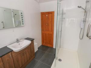 a bathroom with a sink and a shower at The Pirate in Narberth +20 photos