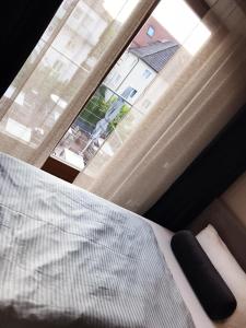Postel nebo postele na pokoji v ubytování Hotel Krumbach
