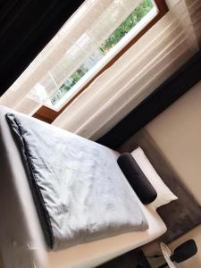 Postel nebo postele na pokoji v ubytování Hotel Krumbach
