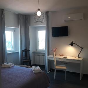 Postel nebo postele na pokoji v ubytování Casa Chiocconi