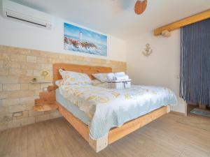 Posteľ alebo postele v izbe v ubytovaní Villa Lea Lana by Interhome