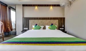 
A bed or beds in a room at Hotel Bikalal, Bikaner
