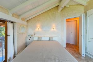 A bed or beds in a room at Lulù