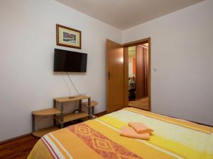 TV a/nebo společenská místnost v ubytování Holiday Home Ana by Interhome