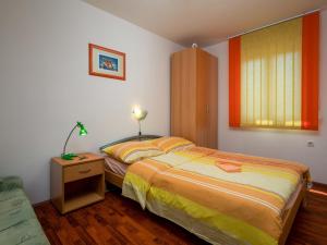 Postel nebo postele na pokoji v ubytování Holiday Home Ana by Interhome