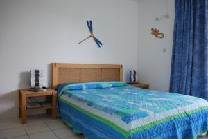 Llit o llits en una habitació de Les Créolines