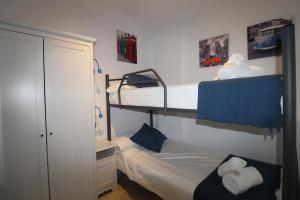 Posteľ alebo postele v izbe v ubytovaní CENTRO ANTEQUERA Apartamento Las Recoletas