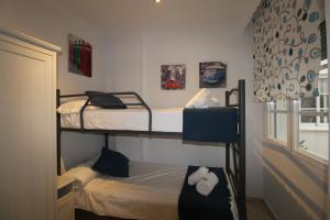 Posteľ alebo postele v izbe v ubytovaní CENTRO ANTEQUERA Apartamento Las Recoletas