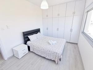 Postel nebo postele na pokoji v ubytování Mackenzie Seaview Paradise