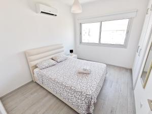 Postel nebo postele na pokoji v ubytování Mackenzie Seaview Paradise