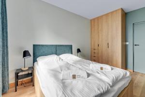 Posteľ alebo postele v izbe v ubytovaní Chill Mood by Baltica Apartments + 12 fotografií
