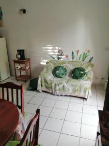 En eller flere senge i et værelse på Gite Belvédère Deshaies