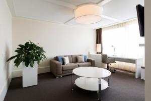 Posezení v ubytování Holiday Inn Eindhoven Centre by IHG