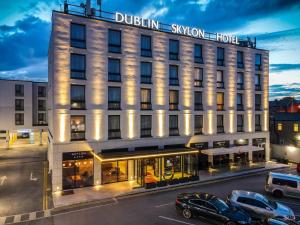 a hotel with cars parked in front of it at Dublin Skylon Hotel in Dublin