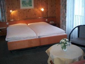 Postel nebo postele na pokoji v ubytování Hotel Restaurant Cristal