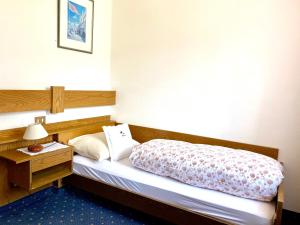Voodi või voodid majutusasutuse Hotel Friedemann toas