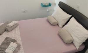 Postel nebo postele na pokoji v ubytování FINA M Studio Apartman
