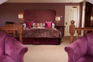 A bed or beds in a room at Rufflets St Andrews 