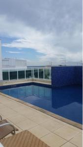 Piscina en o cerca de Flat padrão Biarritz Regiao. QUARTO 607