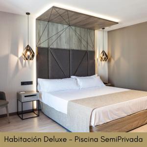 Łóżko lub łóżka w pokoju w obiekcie Hotel Bristol 4 Sup
